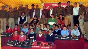 Students of Government Primary School Pacca Talab, Bahu Fort posing alongwith the dignitaries during Civic Action Programme.