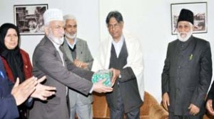 Vice Chancellor of Kashmir University Prof Talat Ahmed being felicitated at a function in Srinagar.