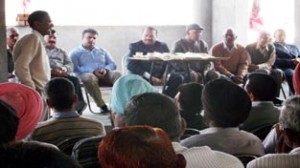 MLA Nowshera Radhey Shyam Sharma addressing a meeting at Sunderbani on Wednesday.