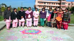 Participants of Rangoli competition posing alongwith the dignitaries at Vimal Muni College of Education in Samba.