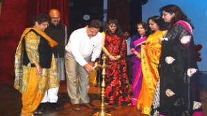 Commissioner, Jammu Municipal Corporation, Kiran Wattal lighting the traditional lamp during annual day function of Nightingale Pre School in Jammu. 