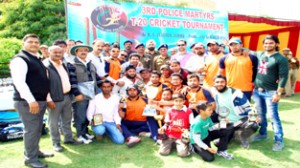 Jubilant team of RCC Srinagar posing for a group photograph alongwith chief guest Rajesh Kumar, IGP Jammu on Saturday. 