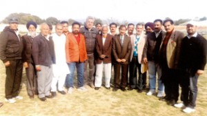 Newly elected office bearers of J&K Veteran Athletic Association posing for a group photograph in Jammu on Monday.