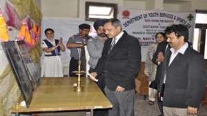 DG Sports, Navin Agarwal and other dignitaries lighting the traditional lamp during concluding function of Basic Scouting Course in Jammu.