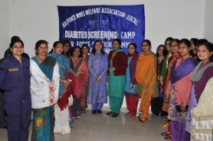 Air Force Wives Welfare Association on the occasion of International Women's Day posing for group photograph on Wednesday.