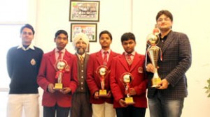 Students of MV International School posing after bagging second place in the National Level Robotryst-2014 at Delhi.     