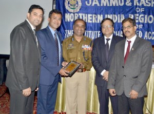 CA Vikram Garg, Chairman, J&K Branch of ICAI presenting a Memo to H K Lohia, IG (Technical Services- J&K Police) during a workshop on Thursday.