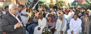 Ajay Sadhotra addressing public meeting at Channo Chak in Marh block on Thursday.