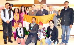 Speedball players posing for a group photograph alongwith DG Sports, Navin Aggarwal and other dignitaries during a felicitation function in Jammu. 