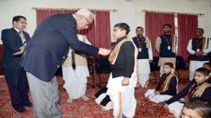 Governor N N Vohra interacting with students of the SMVD Gurukul on Monday.