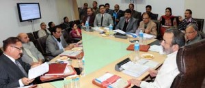 Chief Secretary Mohd Iqbal Khandey chairing a meeting of officers at Jammu on Thursday.