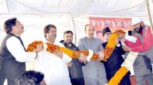 Congress Minister and others garlanding Ghulam Nabi Azad at Jammu on Tuesday.