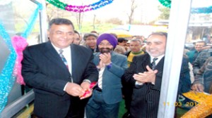 Power Grid GM S K Sharma inaugurating JK Bank ATM at Kishenpur on Tuesday.