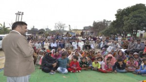 Member Parliament Madan Lal Sharma addressing public gathering in district Samba on Sunday.