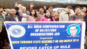 Activists of confederation staging a demonstration in front of Press Club on Monday.
