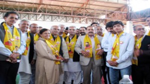 Dr Jitendra Singh with members of Baba Ramdev’s Patanjali Yog Samiti during his poll campaign in Udhampur on Sunday.