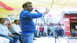 Anil Gupta, Jammu and Kashmir Democratic Front State president addressing a meeting on Wednesday.