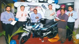 Officials of Jammu Motors launching all new Bajaj Discover 125M at Jammu Motors on Saturday.