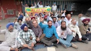 VRS employees raising slogans during protest at Press Club on Wednesday. -Excelsior/ Rakesh