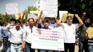 YAIKS activists protesting in front of State Election Office at Jammu on Monday.  -Excelsior/Rakesh