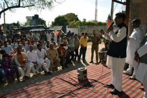 Jugal Kishore Sharma addressing election meeting at Vijaypur on Thursday. -Excelsior/Gautam