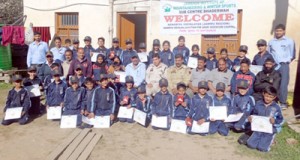 Students displaying certificates while posing for a photograph during concluding function of Adventure Camp at Bhaderwah.                -Excelsior/Tilak Raj