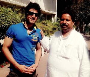 Bollywood actor Arjun Mahajan with Minister for Housing, Raman Bhalla at Jammu on Tuesday.