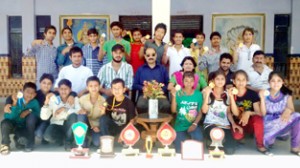 Medal winners posing for photograph.