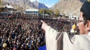 Independent candidate Syed Kazim Sabri addressing a rally at Kargil on Friday.