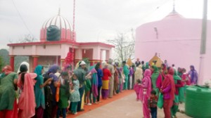 Devotees in queue to pay obeisance at historical Mata Chanchlo Devi Temple at Basohli in Kathua.