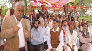 Minister for Planning and Development, Ajay Kumar Sadhotra, addressing an election rally at Flyan-Mandal in Jammu.