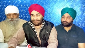 BJP leader, Varinder Jeet Singh, along with other party leaders, addressing a press conference at Jammu.