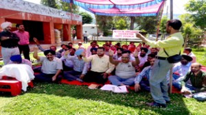 Medical employees raising slogans during protest at Poonch on Thursday.