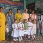 Students of Environment Educational Institute posing alongwith the dignitaries on Tuesday.