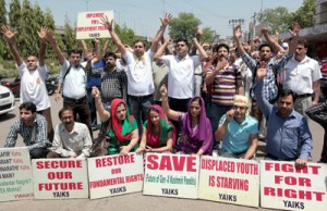 YAIKS activists protesting in front of Press Club at Jammu on Wednesday. -Excelsior/Rakesh