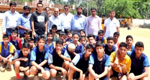 Handball players of various districts posing for a photograph during inter-district championship at Udhampur.