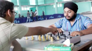 Players making moves during Inter-Department Tournament at University of Jammu on Thursday. -Excelsior/Rakesh