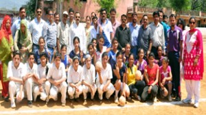 Budding handball players posing alongwith dignitaries and officials in Udhampur on Monday.