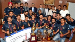 J&K Bank footballers posing alongwith Chairman and CEO of J&K Bank, Mushtaq Ahmad in Srinagar on Wednesday.