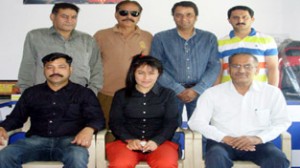 Everester Ram Singh Slathia and Stanzin Youthoj posing alongwith the office bearers of J&K Mountaineering Association.  