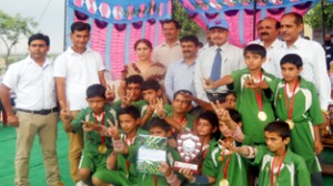 Winners posing alongwith the chief guest and other dignitaries at GHSS Vijaypur in Samba on Friday.