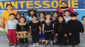 Students posing during story telling competition at JK Montessorie School in Jammu.