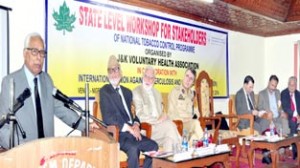 Governor N N Vohra addressing State Level Orientation Workshop at Nigeen Club on Friday.