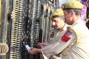 Police officers sealing the brothel at Roop Nagar on Wednesday.—Excelsior/Rakesh