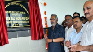 Minister for Health, Taj Mohi-ud-Din inaugurating cathlab of Cardiology Department at SSH on Tuesday.