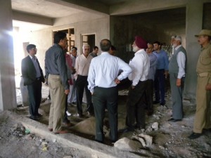 JU VC Prof MPS Ishar and others inspecting construction work of Kishtwar Campus on Thursday.