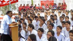 Minister for PHE,  Sham Lal Sharma addressing gathering during awareness camp in Akhnoor on Monday. 