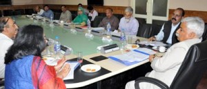 Minister for Labour and Employment, Ajay Sadhotra chairing a meeting at Srinagar on Wednesday.