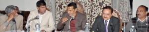 Minister for PHE Sham Lal Sharma and MoS PHE Nazir Gurezi chairing a meeting at Srinagar on Thursday.