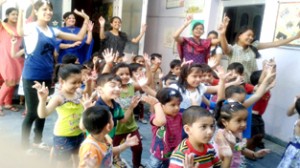 Children performing activity during Summer camp at Daffodils School in Jammu.